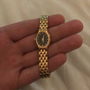 A Females Watch The is mad out of gold.